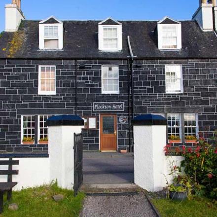 a bench in front of a house