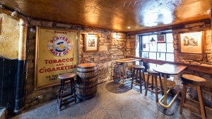 a room filled with furniture and a fireplace